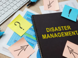 Documents about Disaster Management on a table.